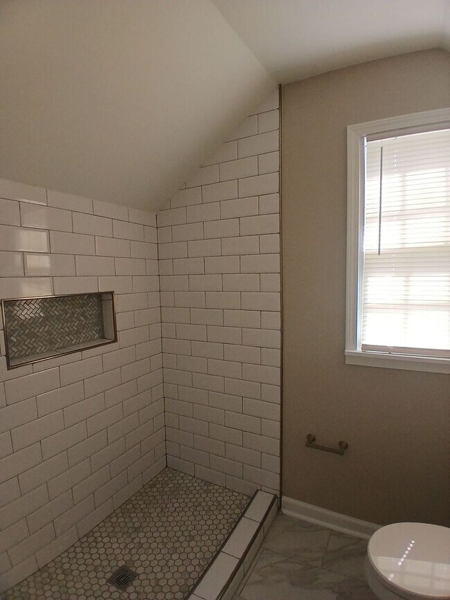 Building Photo - Stunning Renovation with Classic Character and Modern Upgrades