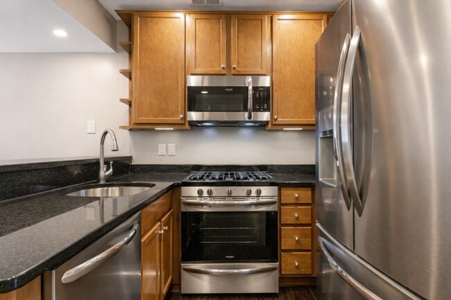 Building Photo - Bright, modern Capitol Hill 1 bed/1 bath condo with private outdoor space and secured parking