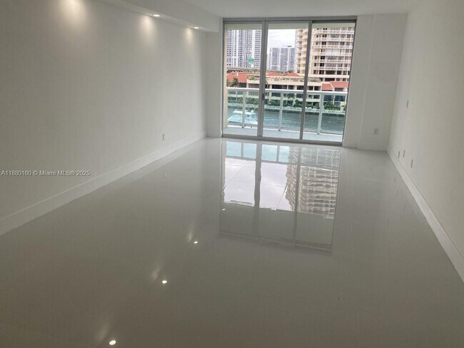 Building Photo - 19390 Collins Ave