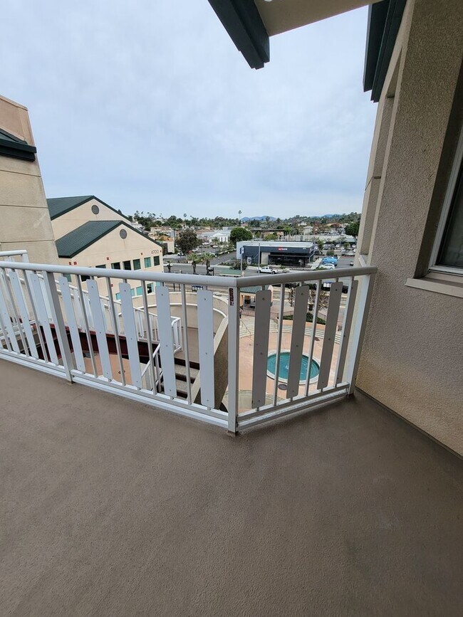 Building Photo - Spacious 2 Bed/2 Bath Condo in the Heart of La Mesa Village offering free COX Cable/WIFI