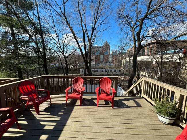 Building Photo - RENOVATED TOWNHOME WITH DECK BY METRO