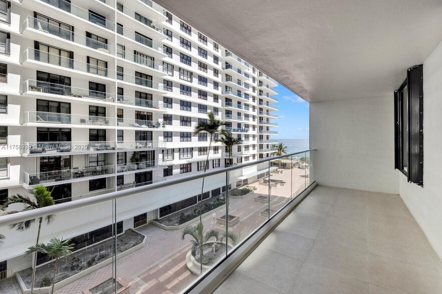 Building Photo - 9801 Collins Ave