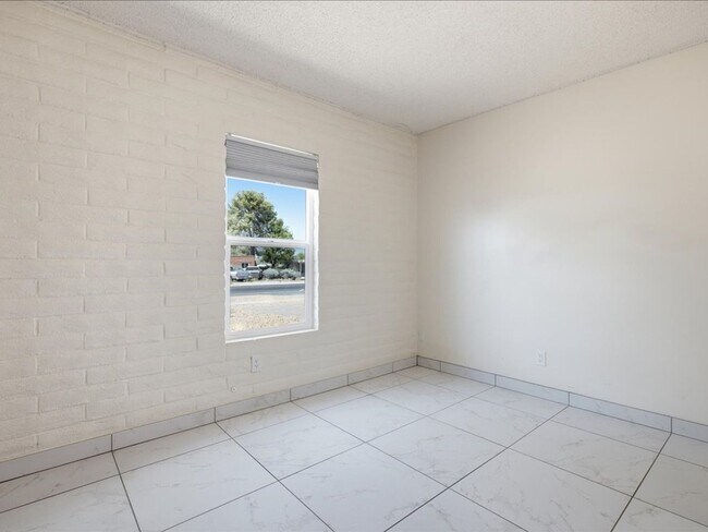 Building Photo - Concept Living with Large Enclosed Backyard & Modern Upgrades!