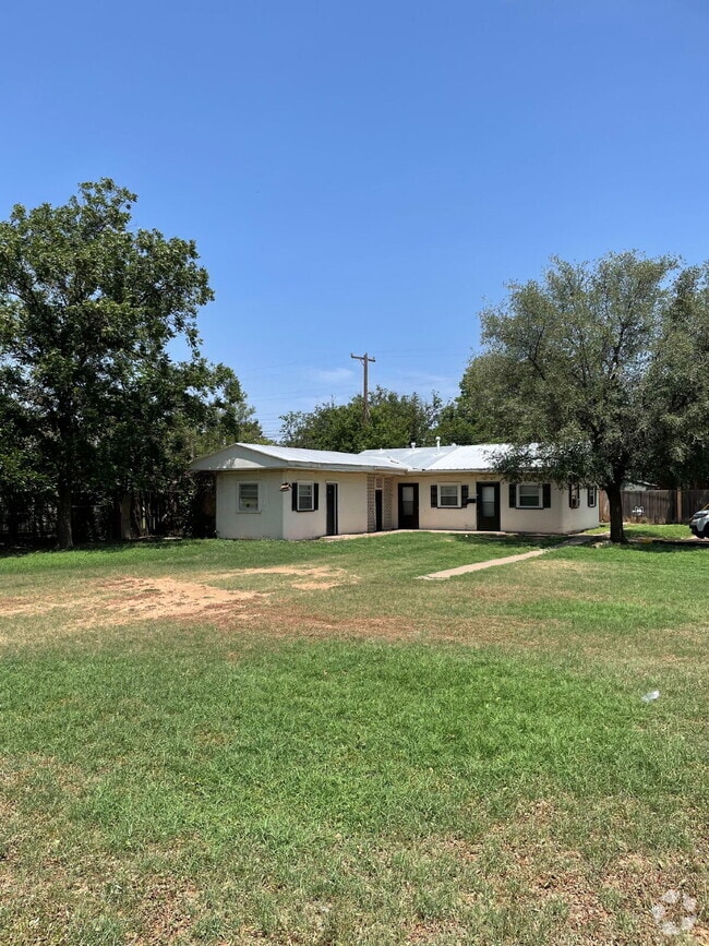 Building Photo - 2/1 with off street parking and large yard.