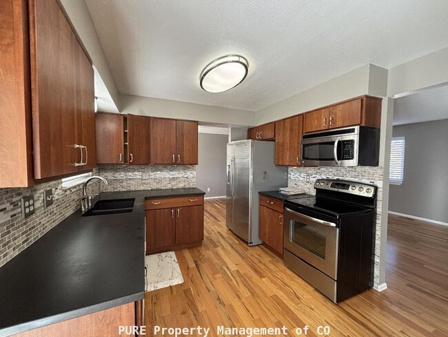 Building Photo - 13710 W 74th Dr