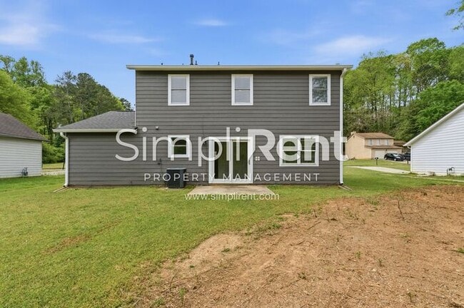 Building Photo - Updated Home with Spacious Layout & Private Backyard
