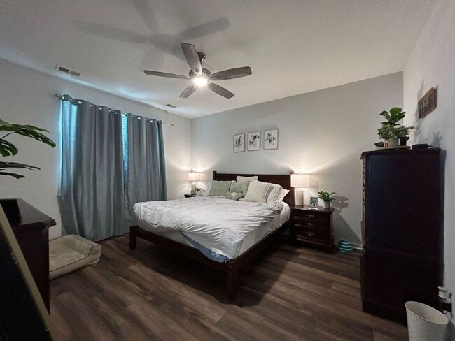 Building Photo - Charming home in Gated Community of Coffee...