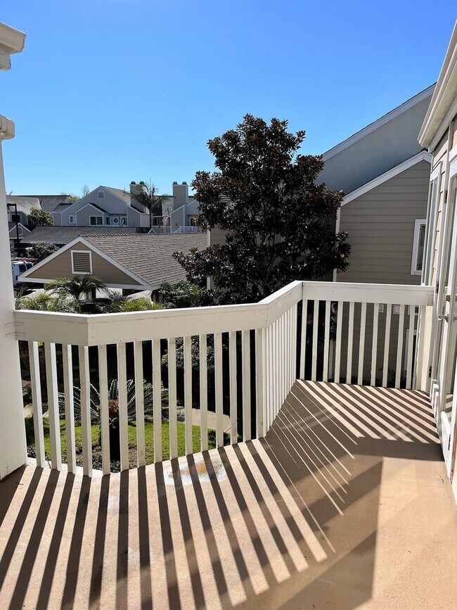 Building Photo - Bright  Upstairs Two Bedroom Condo at Strands Beach with Ocean View