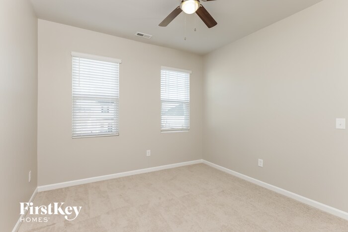 Building Photo - 304 Whispering Wind Way