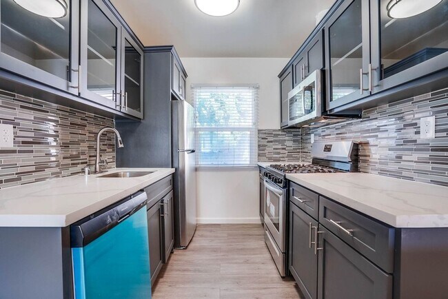 Building Photo - 6307 - 6311 8th Ave