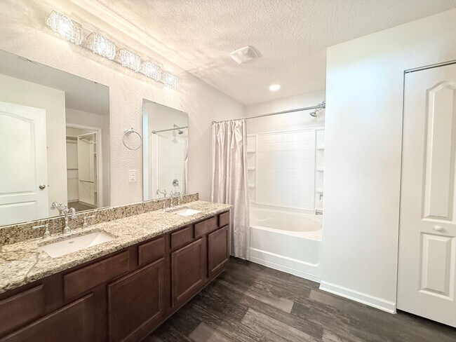 Building Photo - Spacious 4BR Home with Large Fenced Yard & Community Pool