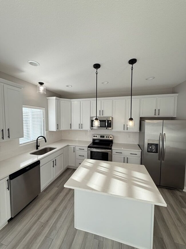 Building Photo - Spacious 4-Bedroom Home with 2-Car Garage & Yard