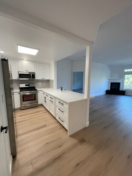 Building Photo - 4477 Woodman Ave