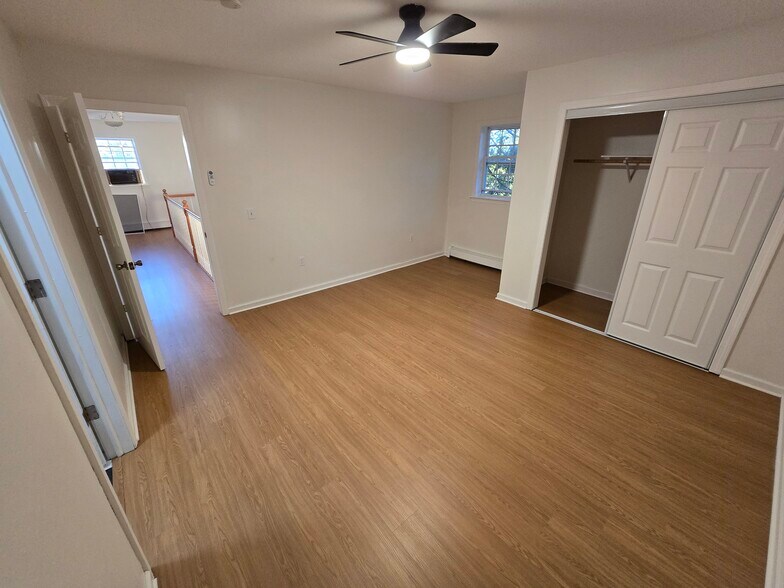 Upstairs bedroom with new flooring - 133 Mitchell St