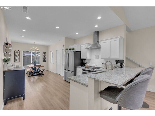Building Photo - Bright Open-Concept Home with Vaulted Ceilings, Private Primary Suite & Stylish Modern Finishes
