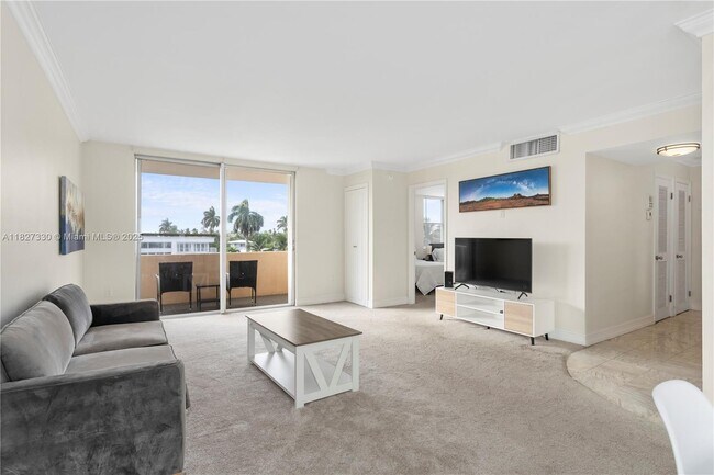Building Photo - 9440 W Bay Harbor Dr