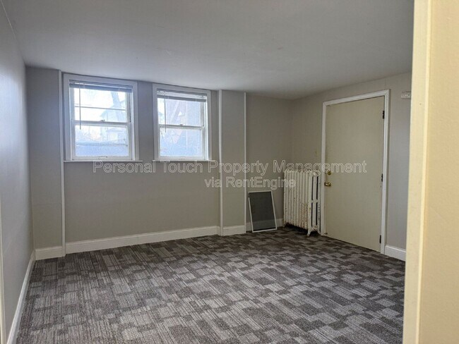 Building Photo - 728 8th St N