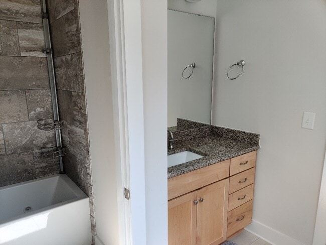 Junior Suite bathroom vanity with granite countertop - 2039 Cartier Way
