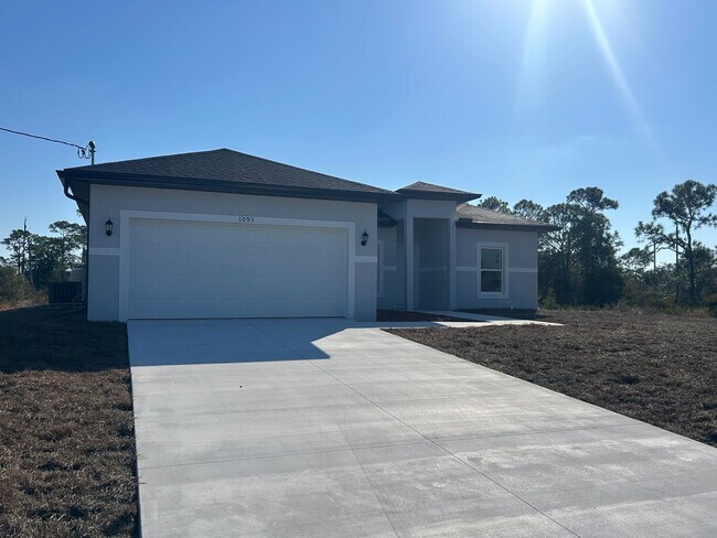 Building Photo - BRAND NEW CONSTRUCTION- 4 Bedroom 2 Bath-2 Car Garage-Serene Lake Placid Location