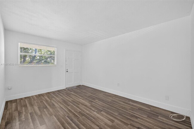 Building Photo - 7130 W 11th Ct