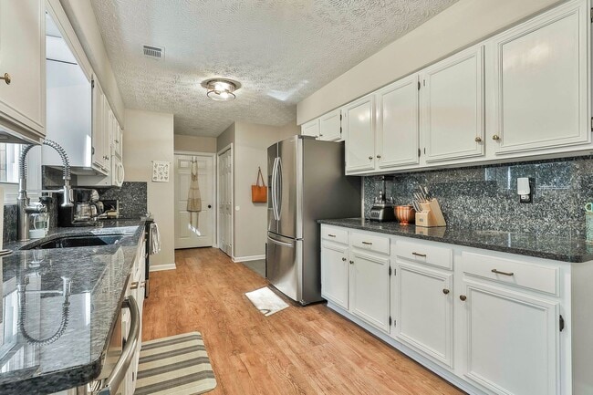 Building Photo - Charming Updated PTC Ranch just steps from...