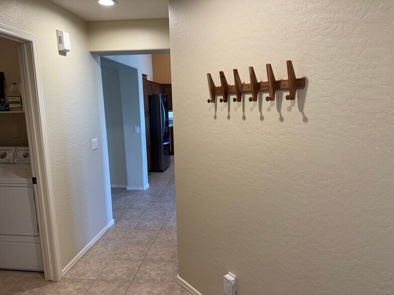 Hall with direct Garage access - 1611 Addington Dr