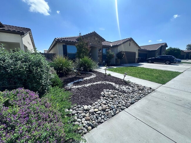 Building Photo - SE Visalia home coming soon! Equipped w/ Solar & Tesla charger