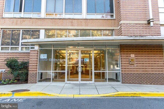 Building Photo - Bright 1BR with Parking Included, Minutes from The Wharf!