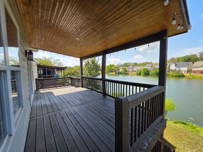 Building Photo - Lakefront 3BR/3BA with Water Views, Garage & Covered Deck