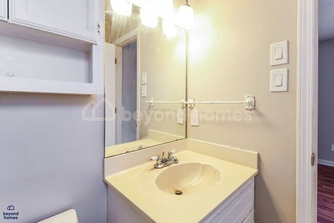 Building Photo - Move-In Ready Gem with Massive Fenced Yard & Private Deck!