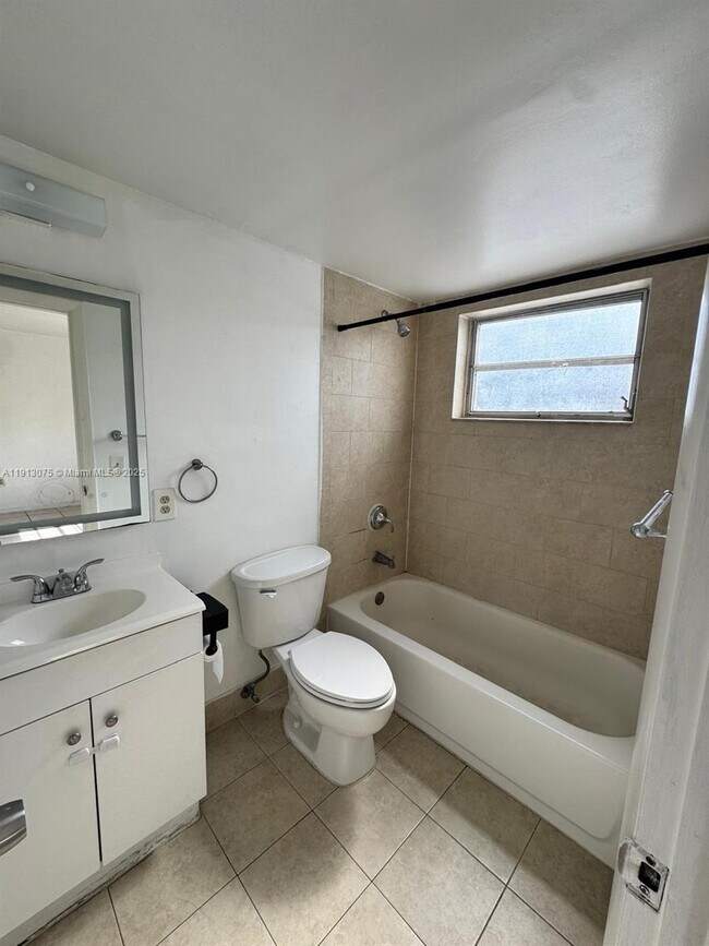 Building Photo - 1230 W 54th St