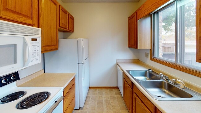 Building Photo - Sublease - 2 Bedroom Townhome Available March 9th, 2026