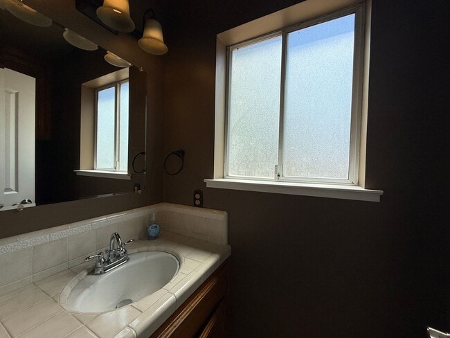 Building Photo - Stunning three-story home located in the c...