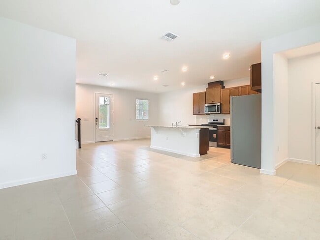 Building Photo - New Luxury Townhome in Celebration, FL Corner unit.  All porcelain tiled floors.  Aleutian model ...