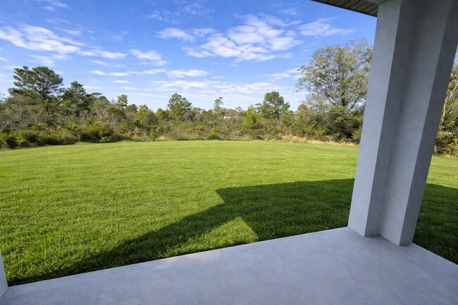 Building Photo - BRAND NEW Modern 4BR/2BA Home with Garage – Peaceful Lake Placid Retreat