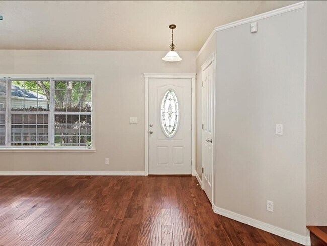 Building Photo - June Rent Free!!  Move Today!  Four Bedroom, Three Bath Home with Beautiful Backyard, Two Car Gar...