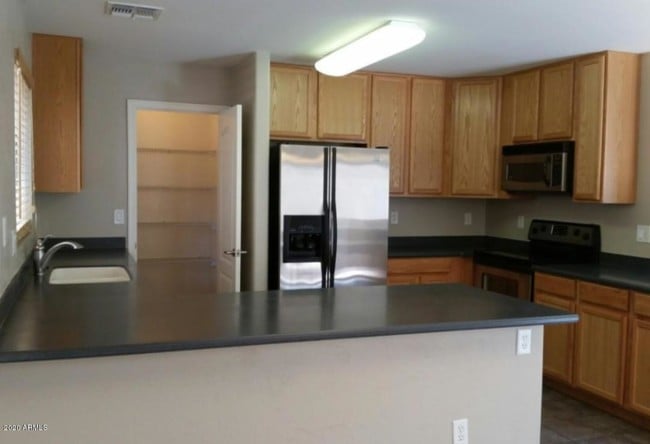 Building Photo - 12925 W Fleetwood Ln
