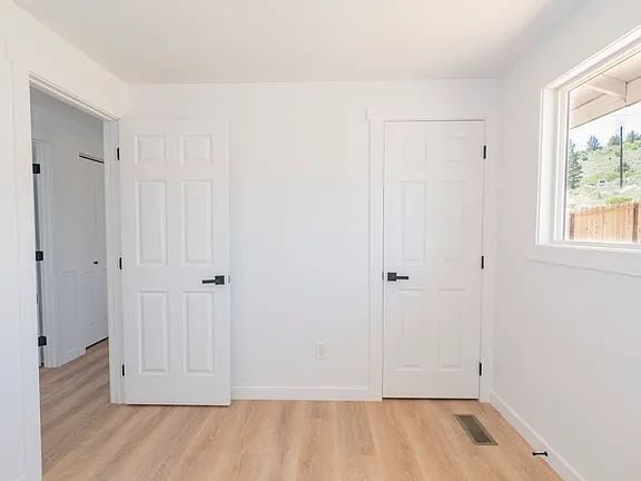 Building Photo - "Charming 5-Bed Sanctuary with Cozy Fireplace on South Rogers Street!"