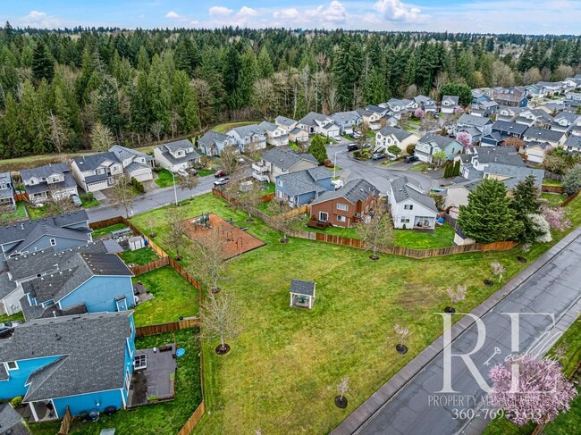 Building Photo - Peaceful Retreat Near JBLM | Spacious 3BR ...