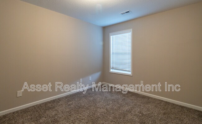 Building Photo - 8205 Zodiac Ln