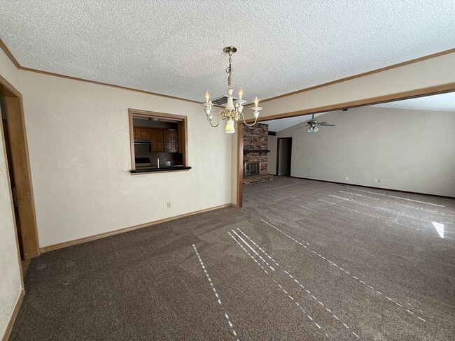 Building Photo - Huge Living Area, Storage Shed, Fenced Yard 3 bedroom Home