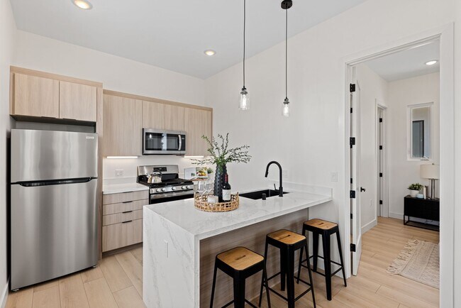 Building Photo - BRAND NEW Top Floor Home Available! 1 Bedroom, In-Home Laundry, Parking, View