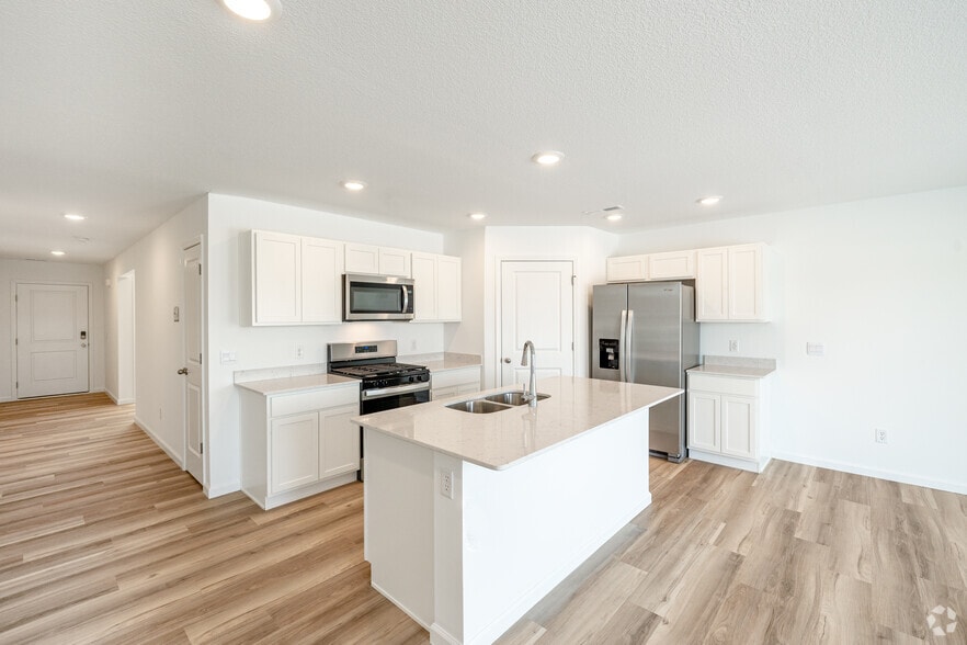 3BR, 2BA - 1,498SF - Unit A - Kitchen - Thunderhawk Villas