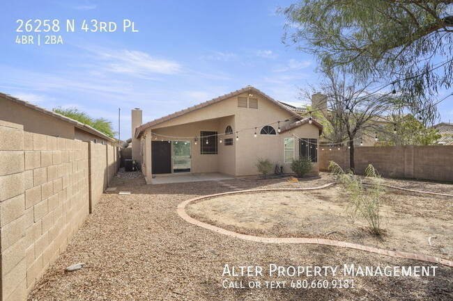 Building Photo - NEWER QUARTZ 4BR 2B