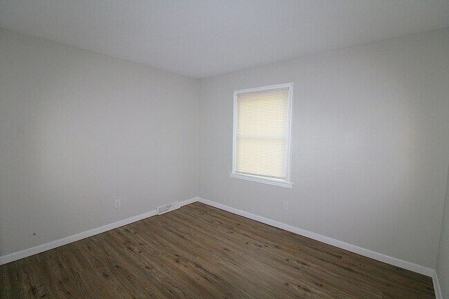 Building Photo - Updated with Modern Finishes!