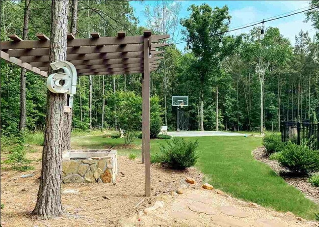 Building Photo - Luxurious 4-Bed, 4-Bath Wake Forest Retrea...