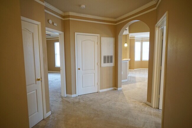Building Photo - 2-Bed, 2-Bath, Condo with Garage in The Villas Condominiums