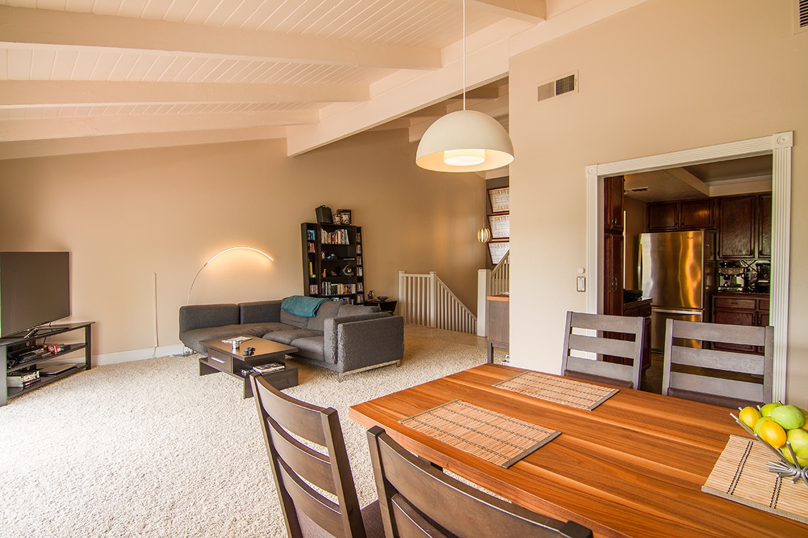 Dining area and living room made bright by large sliding glass doors and windows. - 2838 Luciernaga St