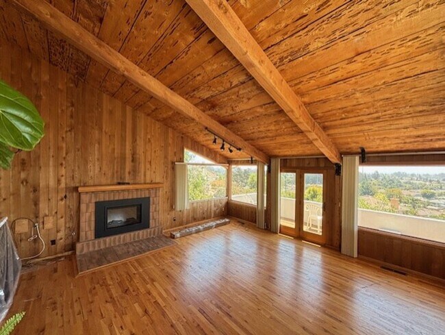 Building Photo - Stunning Hilltop Retreat with Panoramic Oc...