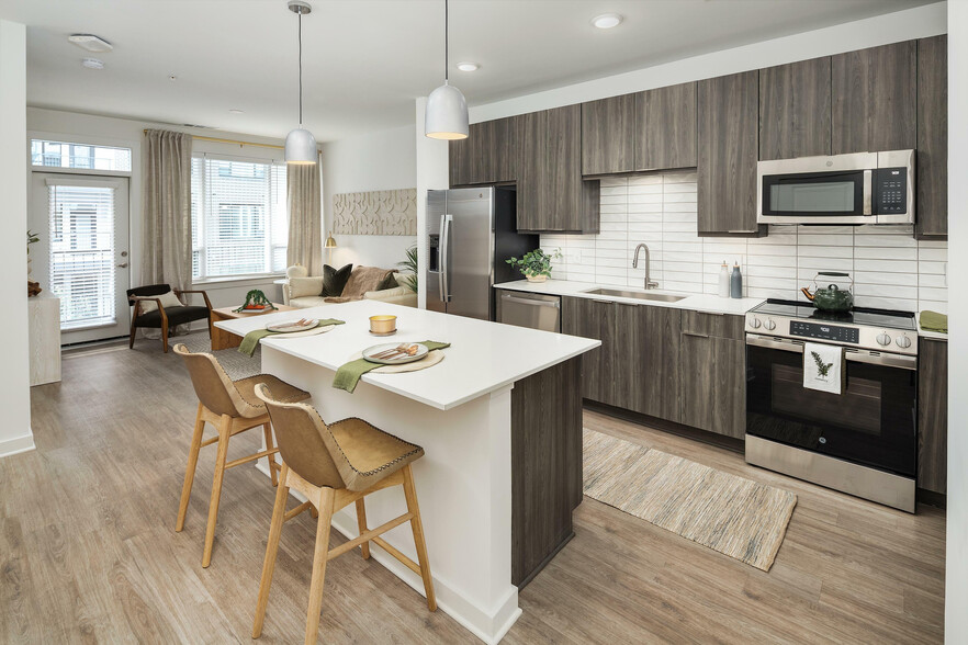 Experience the elegance of this chic urban kitchen, perfect for modern living. - Solis Dresden Village